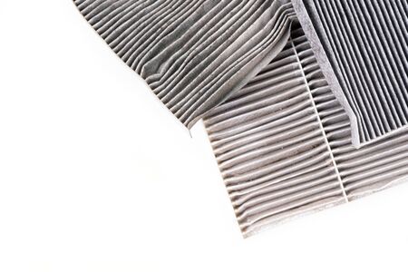 dirty car air conditioning filter isolated on white backgroundの写真素材