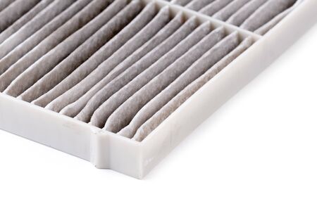 dirty car air conditioning filter isolated on white backgroundの写真素材