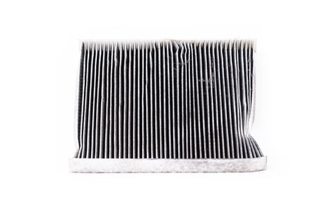 dirty car air conditioning filter isolated on white backgroundの写真素材
