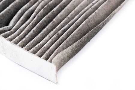 dirty car air conditioning filter isolated on white backgroundの写真素材