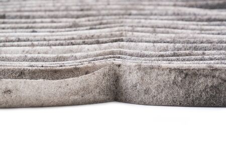 dirty car air conditioning filter isolated on white backgroundの写真素材