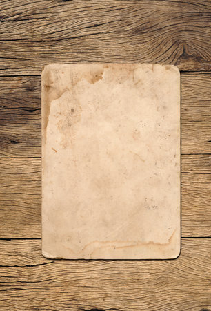 Old vintage paper texture background on wood boardの写真素材