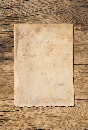 Old vintage paper texture background on wood boardの写真素材