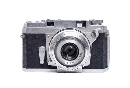 vintage photo camera isolated on a white backgroundの写真素材