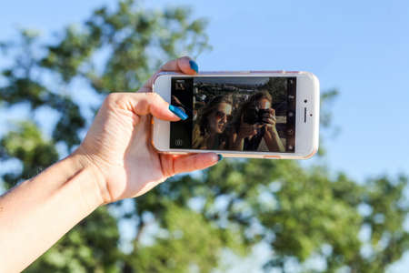 two girls making selfieの写真素材
