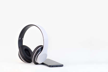 White and black wireless earphone,headphone equipment for listening musicの写真素材