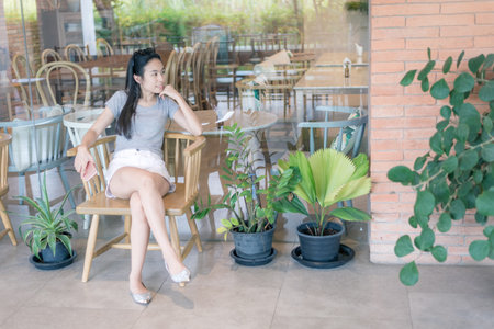 Lady sit on chair and think