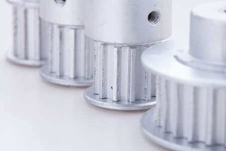 timing pulleys on white の写真素材