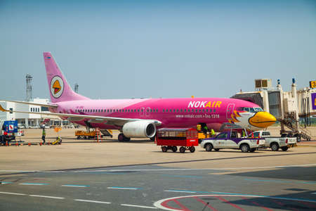 BANGKOK, THAILAND - October 16, 2014: Nok Air plane at Donmueng International Airport on Oct 14, 2014 in Bangkok, Thailand. Nok Air is the budget airline of Thai Airways International.のeditorial素材