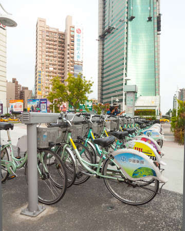 KAOHSIUNG - TAIWAN July 06: The public bicycle for rent in Kaohsiung 06 July 2014. The public bycicle are located at MRT station in  Kaohsiung, Taiwan. They allows for Kaoshiung resident and  tourists rent for travelling in downtown.のeditorial素材