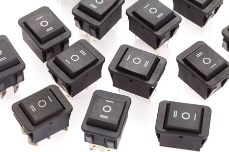 6 pin dpdt on-off-on Rocker switch on white backgroud. The color is black