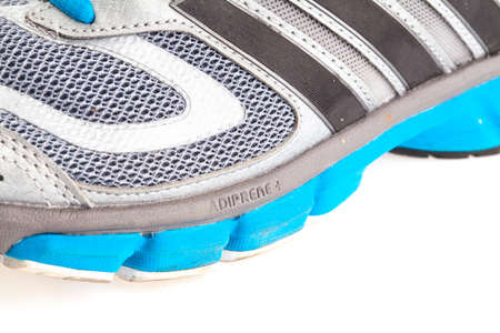 JANUARY 27, 2015 - THAILAND : running shoes of the brand "Adidas" on isolated white background. ADIPRENE technology by Adidasのeditorial素材