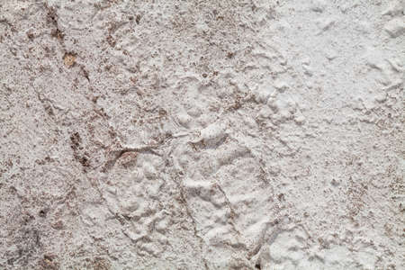 Concrete gray wall and the old light paint was peeling on the wallの写真素材