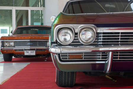 SONGKHLA, THAILAND - MARCH 31st 2016: Meeting of classic american cars, in Hatyai Motor Show 2016, on March 31st, 2016. Double headlight in Chevrolet Impala, 327.のeditorial素材
