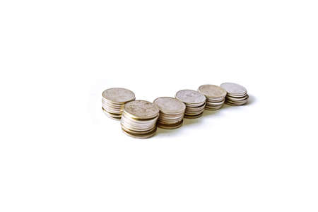 Check mark by rows of coins on white background ,Business and financeの写真素材
