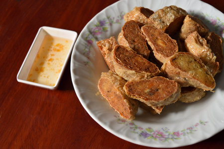 Deep Fried Crab Meat Rolls or Hoi Jo with Rosaceae sauce , Traditional local Chinese food for...