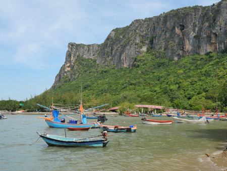 Trawler and Fishing boat at sea with mountain with bridge and the island at Prachuap Bay, Prachuap...