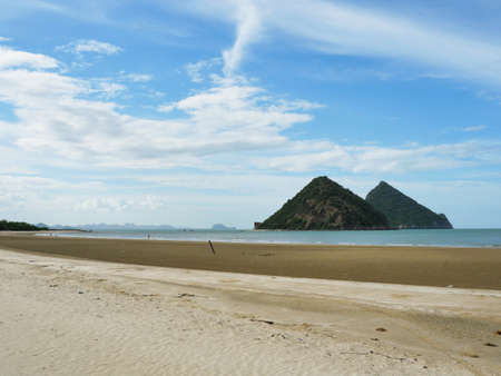 Wave splashing on the sandy beach, Sea with island in background , Khao Sam Roi Yot National Park , Prachuap Khiri Khan , Thailandの写真素材