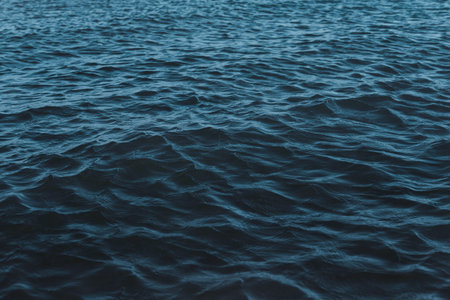 macro texture of the water surface, blue sea waves.