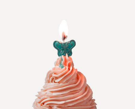 strawberry cream birthday cupcake with butterfly candle light