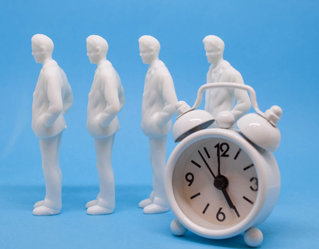 boring and routine work life with white men concet abstract figures in blue backgroundの写真素材