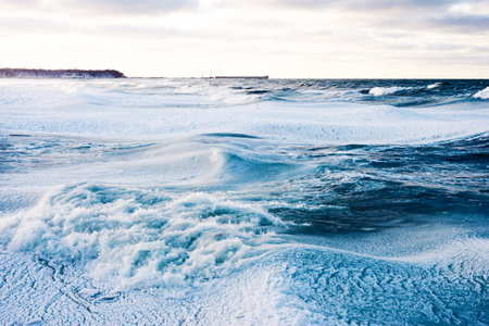Frozen Baltic sea in the winter in stormの写真素材