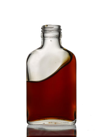 Bottle of whiskey on a white background.の写真素材