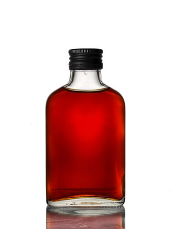 bottle of cognac isolated on white backgroundの写真素材