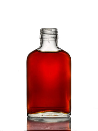 bottle of cognac isolated on white backgroundの写真素材