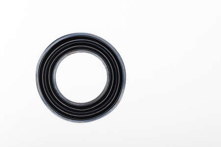 Black rubber ring - gasket, parts for car repair. A set of spare parts for servicing the braking system of a vehicle. Details on white background, copy space available.の写真素材