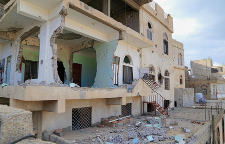 Residential neighborhoods destroyed by rocket projectiles due to the war in Yemen.のeditorial素材