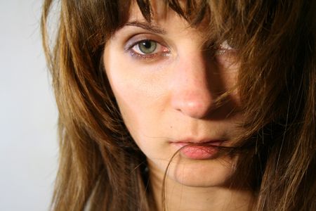 Sad tender looking womanの写真素材