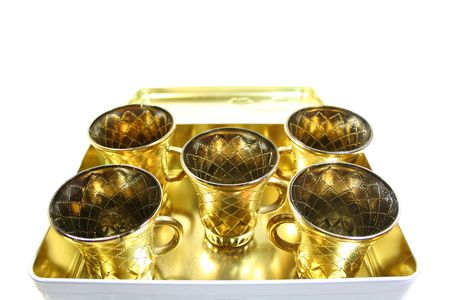Five isolated gilt cups in a boxの写真素材