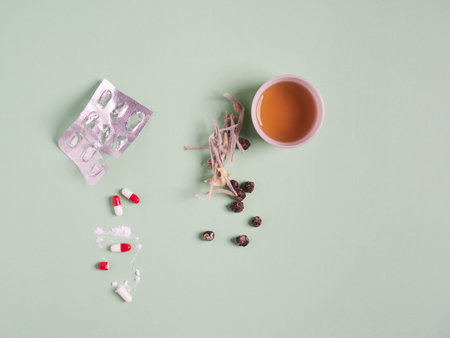 herbal tea or pills medication treatment choice for illnessの写真素材