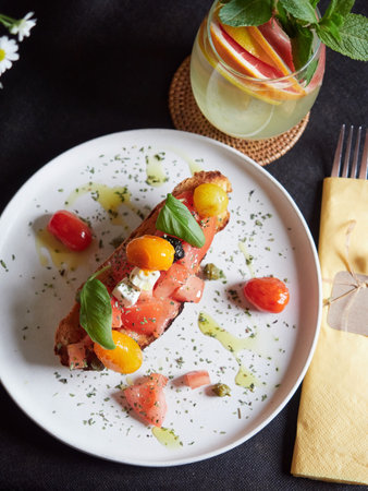 Italian bruschetta with tomatoes, mozzarella and basilの写真素材
