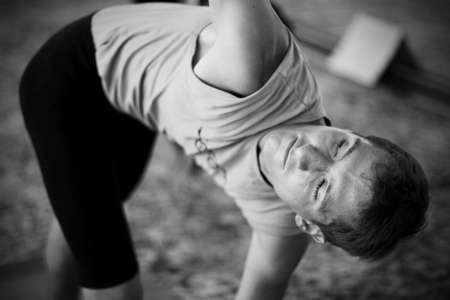 man doing yogaの写真素材