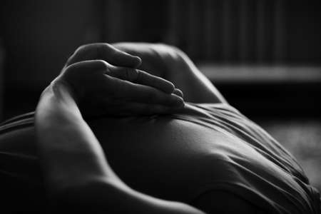 male arms doing yogaの写真素材