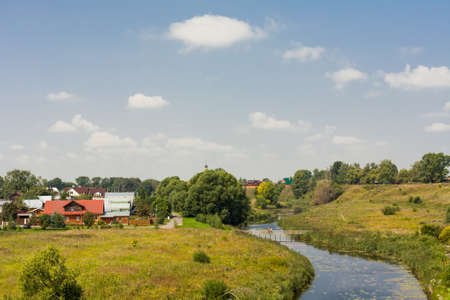 Landscape view of a rural area under blue skyの写真素材