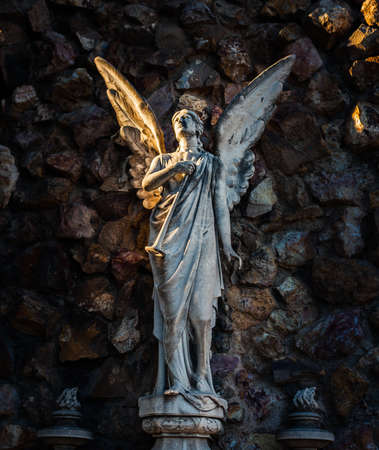 Tomb with an angel statue on Montjuic Cemetery in Barcelona, Spainの写真素材