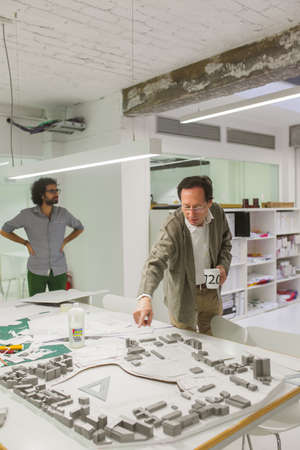 BARCELONA, SPAIN - OCTOBER 7,2015: Engineer men developing architecture projectのeditorial素材