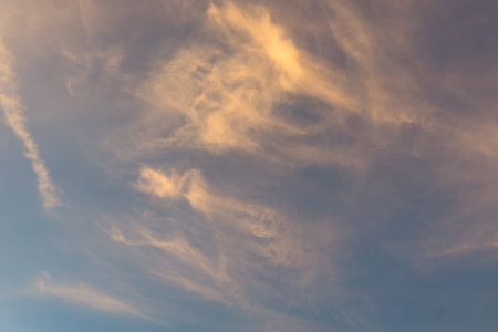 Sky with clouds and sunlight.
