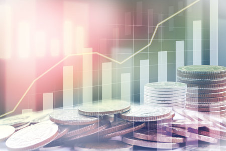 Investment concept stock market trading line graph and chart bar with coins foreground. background...