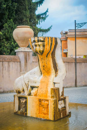 TIVOLI, LAZIO, ITALY - May 24, 2013 - "A broken kiss" sculpture by Igor Mitoraj in front of the entrance of the Villa d'Este.のeditorial素材