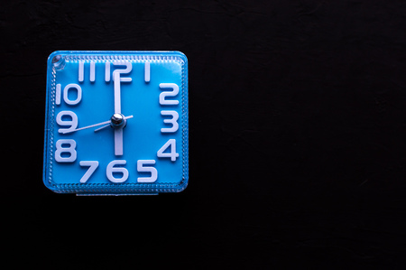 Alarm Clock Isolated on Niagara Blue Background. Time Alert Deadline Concept. Flat Lay. New year resolution theme. Time.の写真素材