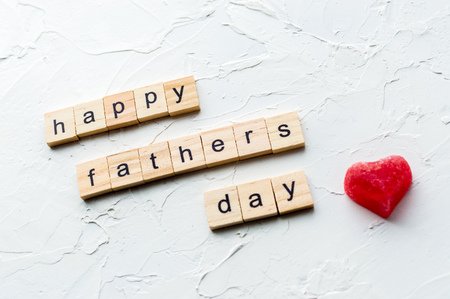 Father's day concept. Red heart and greetings on a white backgroundの写真素材