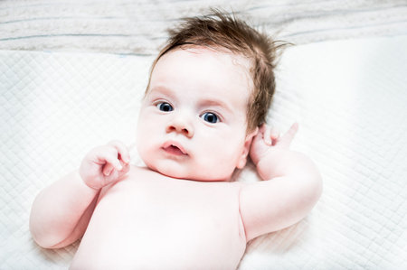 Closeup portrait of a small child. Infant portrait. Funny baby