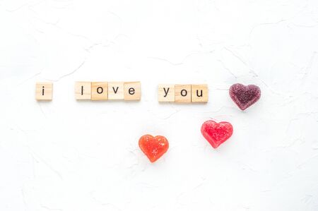 inscription i love you on white wooden background.concept.の写真素材