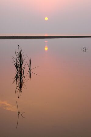 Sunset and the White Sea in summer seasonの写真素材