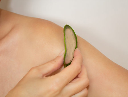 Woman skincare with aloe leafの写真素材