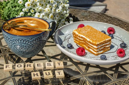 Still life, coffee and cake in a cafe on the street
